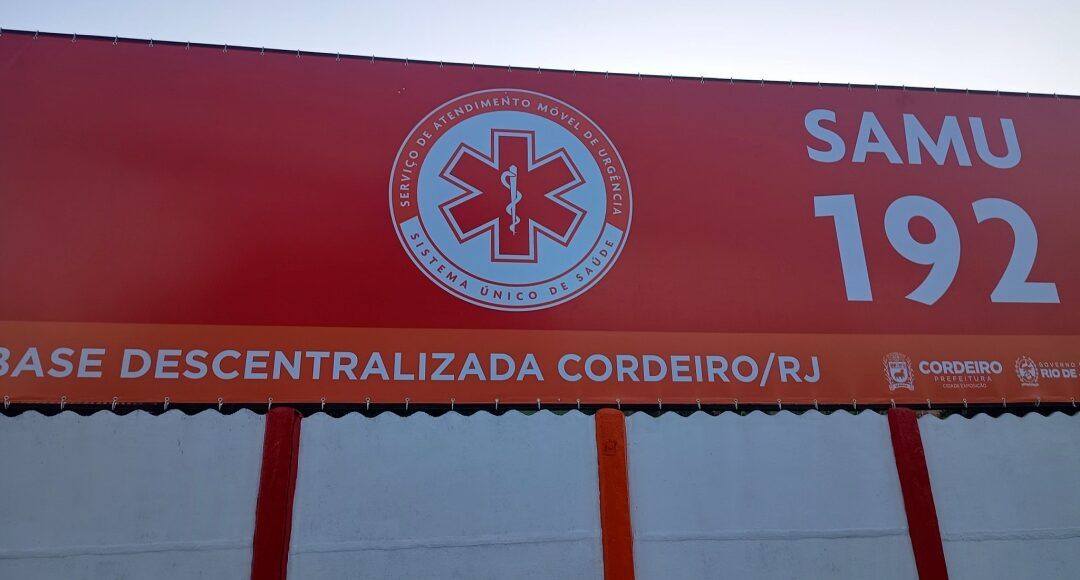 a red sign with white text and a symbol on it